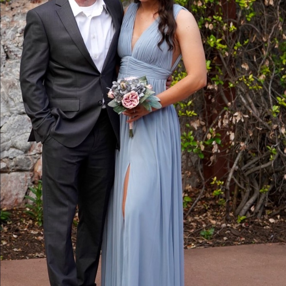 Floor length, bridesmaid dress in a dusty blue color by Azazie. Size 6